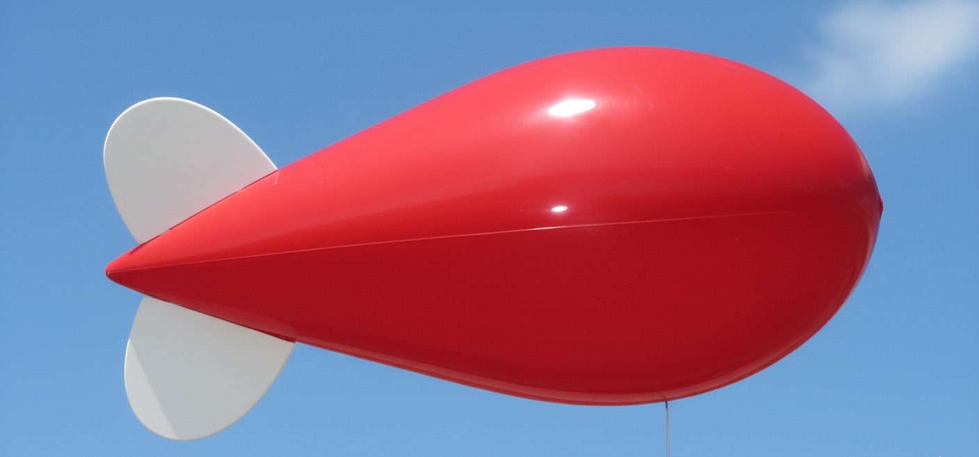 compact 10ft red helium advertising blimp - small format aerial marketing for new homes